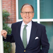 A man smiling at the camera