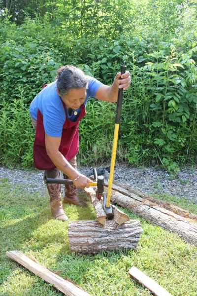 Betty Maney preparing white oak for baskets