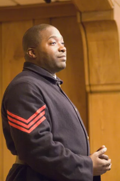 Mr. Davis on stage as A.A. Burleigh
