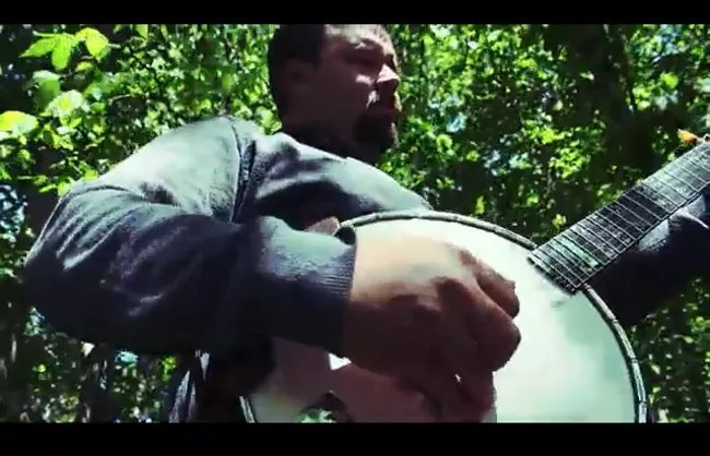 Brandon playing banjo