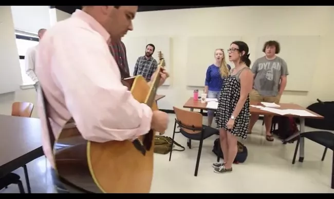 Brandon teaching a harmony singing class