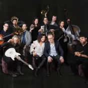 A group of people holding instruments