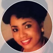 A woman smiling into the camera