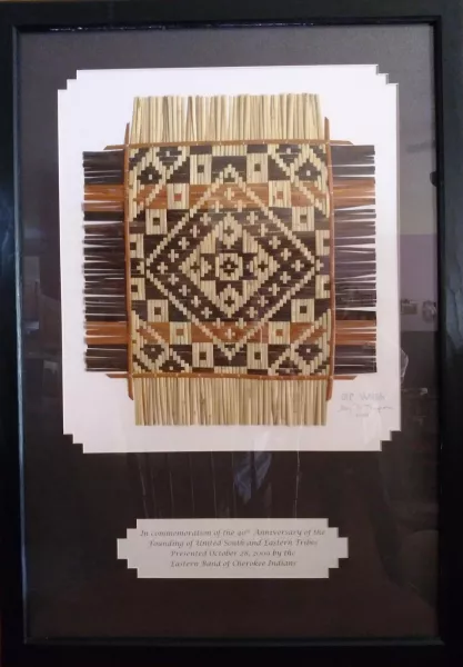 Framed woven mat