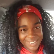 A person smiling into the camera