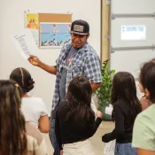 Man teaching children
