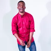 A man smiling into the camera