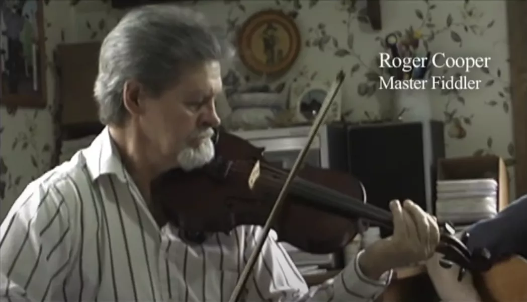 Scene from documentary about Cooper