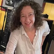 A person smiling into the camera