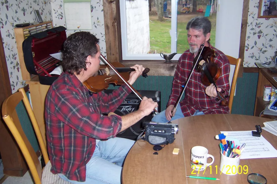 Cooper with his apprentice, Scott Miller