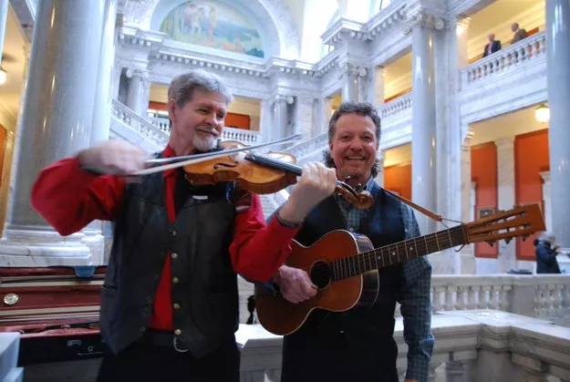 Cooper performing with a partner