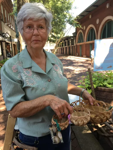 Charlene presenting baskets