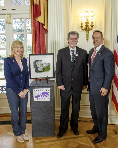 Cooper posing with Kentucky governor