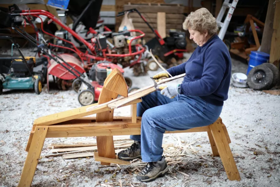 Sue working on a basket