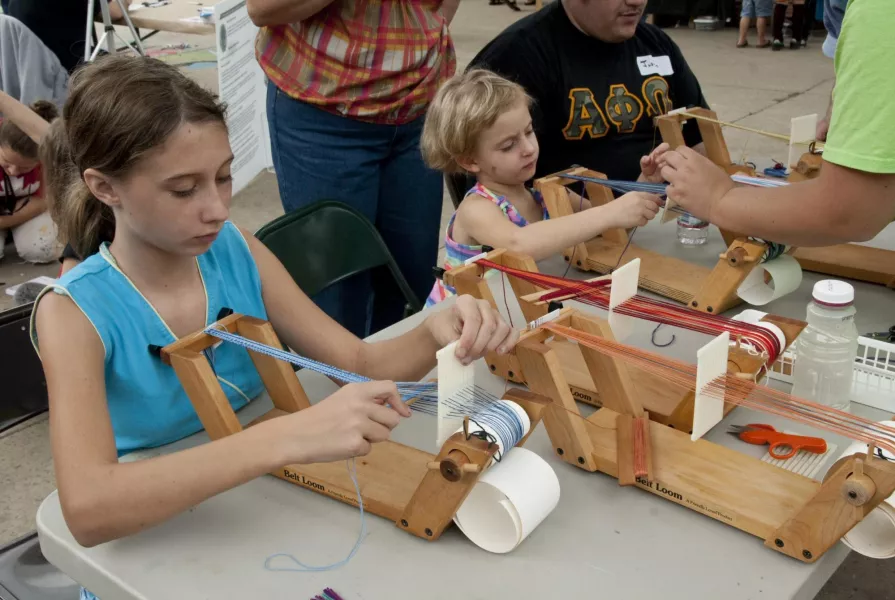 Young people weaving