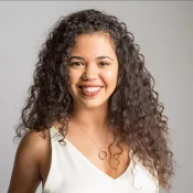 A woman smiling into the camera